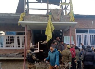 A property being attached in Kulgam.