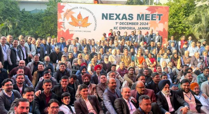 Alumni of Sainik School Nagrota attentively watching the program during the NEXAS get-together.