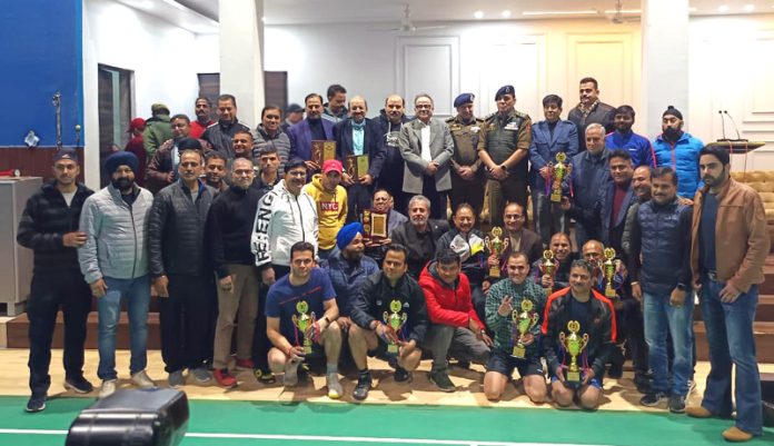 DIG Jammu Shiv Kumar Sharma posing along with others during prize distribution ceremony of 2nd Masters' Badminton Tournament 2024 at Gulshan Ground, Jammu.