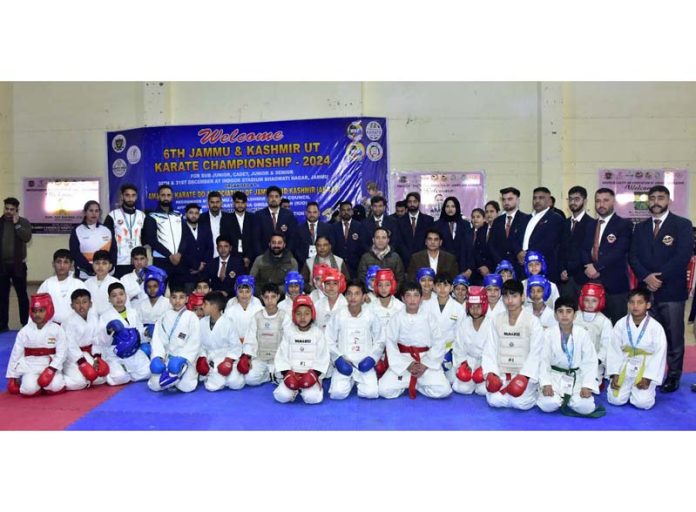 Karate players posing along with dignitaries at Jammu.