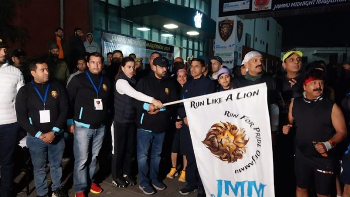 Minister flagging off Jammu Midnight Marathon Season 2 at MA Stadium Jammu.