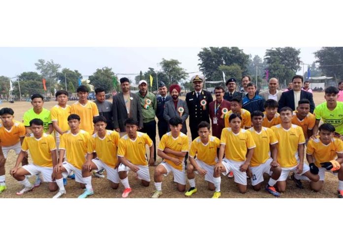 DG, YS&S, Rajinder Singh Tara posing along with football players and others.