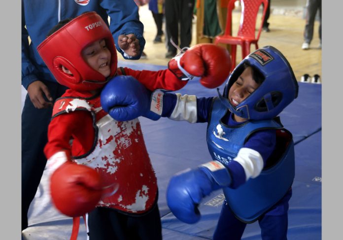 Wushu players in action during a match at Bhagwati Nagar, Jammu. -Excelsior/Rakesh