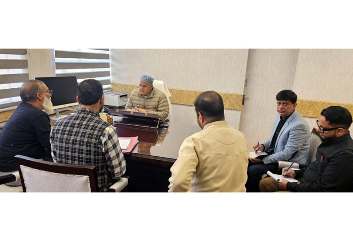 Minister Javed Ahmad Dar chairing a meeting on Tuesday.