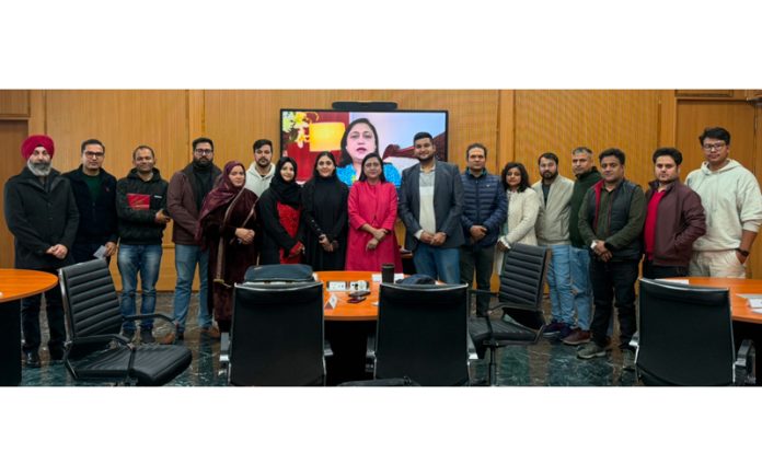 Participants and resource person during an awareness session at IIM Jammu.