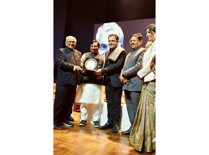 Renowned exporter from J&K Arshad Mir being presented Atal Gaurav Samman at Delhi on Saturday.