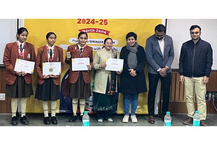 Spring Dales English School Kathua students posing along with medals and certificates at IIT Delhi.