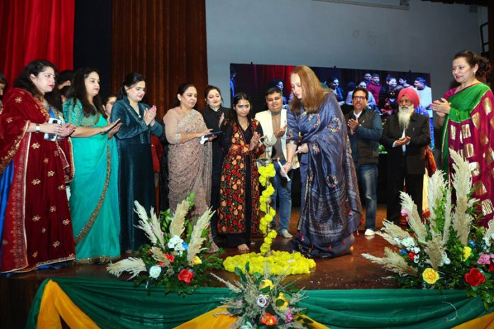 Chief guest lighting the traditional lamp during the inaugural event of Annual Day at Sanfort School.