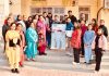 Ex-students of SPPND GDC Samba and others posing for a group photograph during an Alumni Meet.