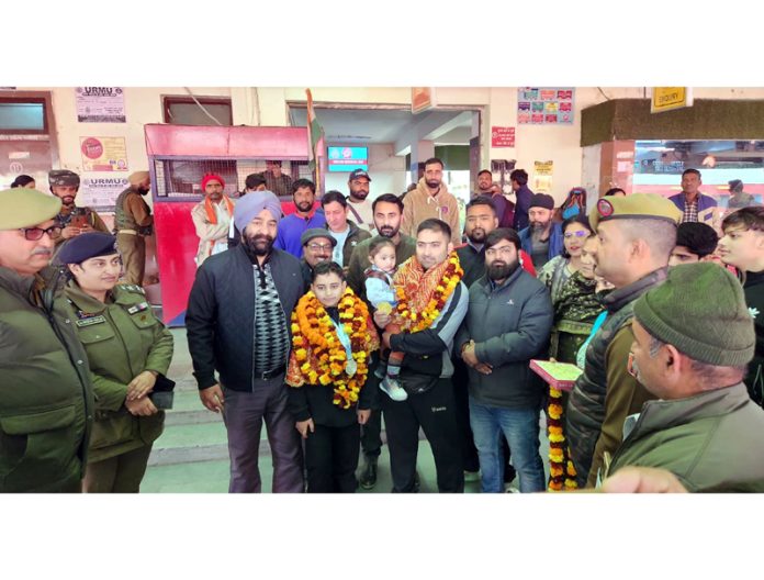 Medal-winning Wushu players receiving a warm reception at Jammu Railway Station.