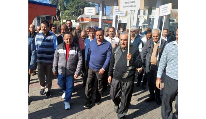 Retirees protesting in front of J&K Grameen Bank Headquarters at Narwal on Wednesday.