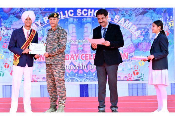 Chairman APS Samba presenting award to a student during Annual Day event.