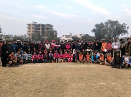 Kho Kho teams posing along with dignitaries during Open District Kho-Kho C'ship.