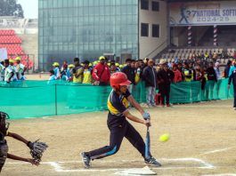 Softball players in action during a match at MA Stadium Jammu.