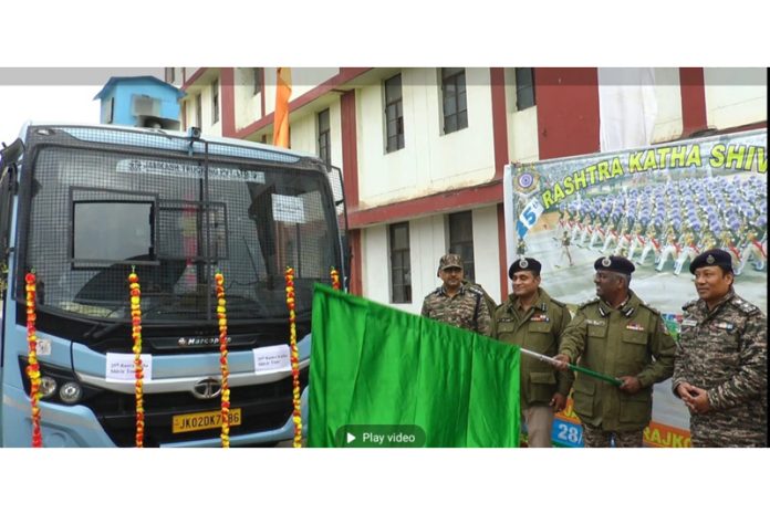 A CRPF officer flagging off Rashtra Katha Shivir Yatra from Jammu on Monday.