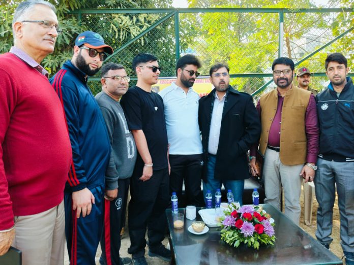 Minister for Sports Satish Sharma posing with visually impaired cricketers.