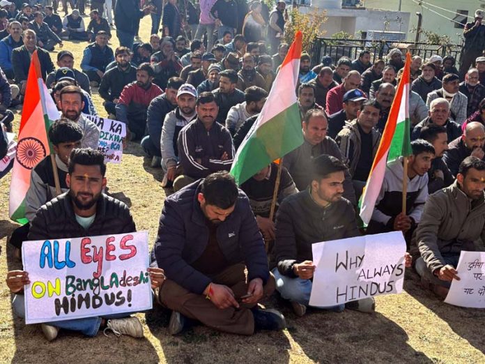 SDS activists staging a protest against attack on Hindus in Bangladesh at Kishtwar on Friday.