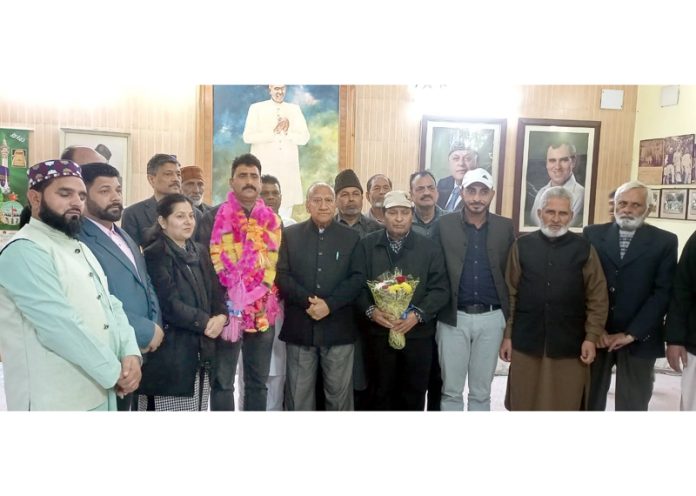 Rattan Lal Gupta posing along with new office bearers in Jammu on Tuesday.