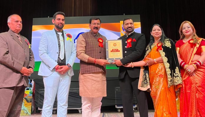 MLA West, Arvind Gupta receiving memento from Management during Annual Day event.