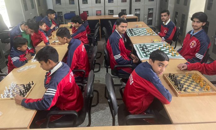 Players keenly participating in Chess championship.