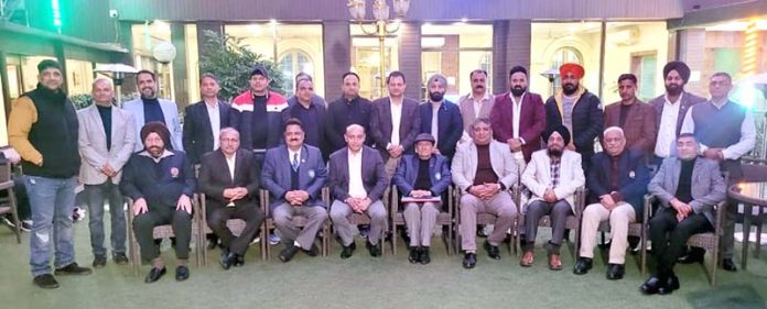 The newly elected body of Jammu and Kashmir Olympic Association posing for group photograph.