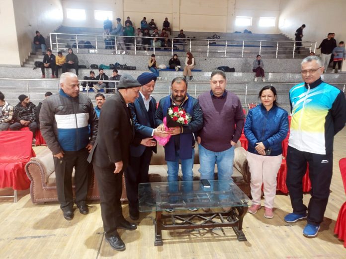 Vikram Randhawa, BJP MLA from Bahu receiving bouquet during inaugural event of J&K UT Weightlifting Championship at Bhagwati Nagar, Jammu.