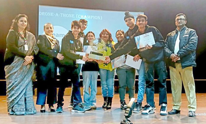 Students of Jodhamal School receiving certificates from dignitaries at Gurugram.