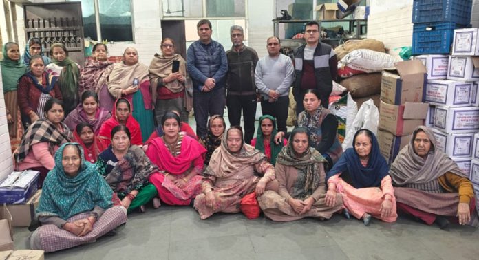 BJP leaders along with others during a membership drive camp in Jammu on Wednesday.