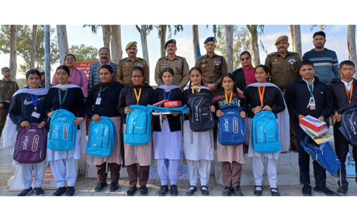 School students with police officers in Samba.