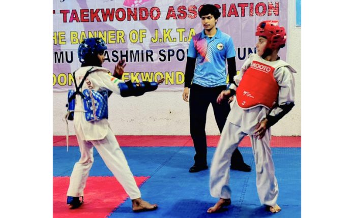 Players in action during 7th District Poonch Taekwondo Championship on Friday.