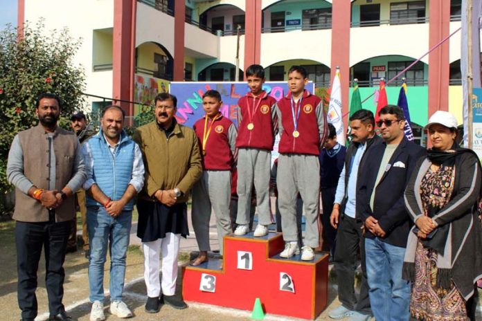 Arvind Gupta, MLA Jammu West posing along with medallists during Annual Sports meet of PWHS Higher Secondary School, Pouni Chak.