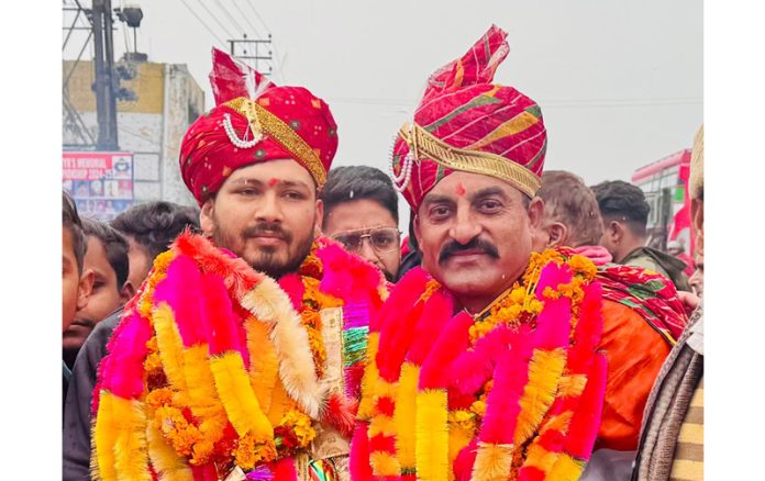 Athletes Haripal Singh and Umesh Kumar garlanded by locals on their return to Kathua on Friday.