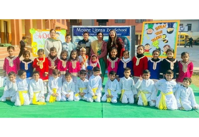 Students of Flower Kids Nursery School, Talab Tillo posing for group photograph.