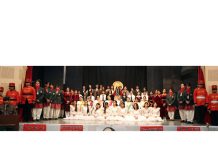 Students of Presentation Convent Senior Secondary School posing for group photograph along with dignitaries during Annual Day event.