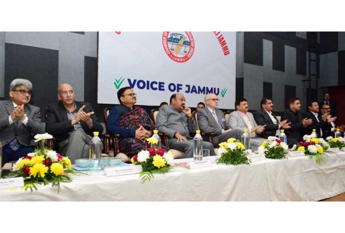 CM Omar Abdullah alongwith others addressing a gathering on Monday.