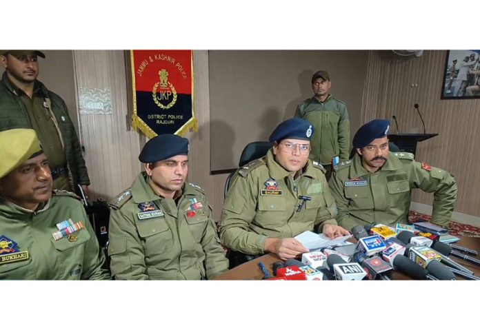 SSP Rajouri Gaurav Shikarwar flanked by others talking to mediapersons on Monday. — Excelsior/Imran