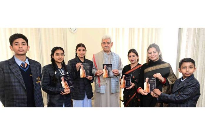 Lieutenant Governor Manoj Sinha meeting class 10th student, Nandini Dabgotra on Monday.