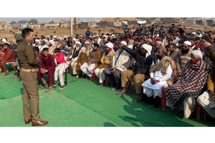 SSP Jammu Joginder Singh listening to the grievances of Gujjar Basti residents in Bishnah on Wednesday.