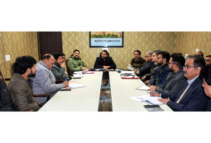 DC Jammu chairing a meeting on Tuesday.