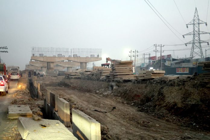 A view of under construction flyover at Sanat Nagar junction on NH 44 in Srinagar. -Excelsior/Shakeel.