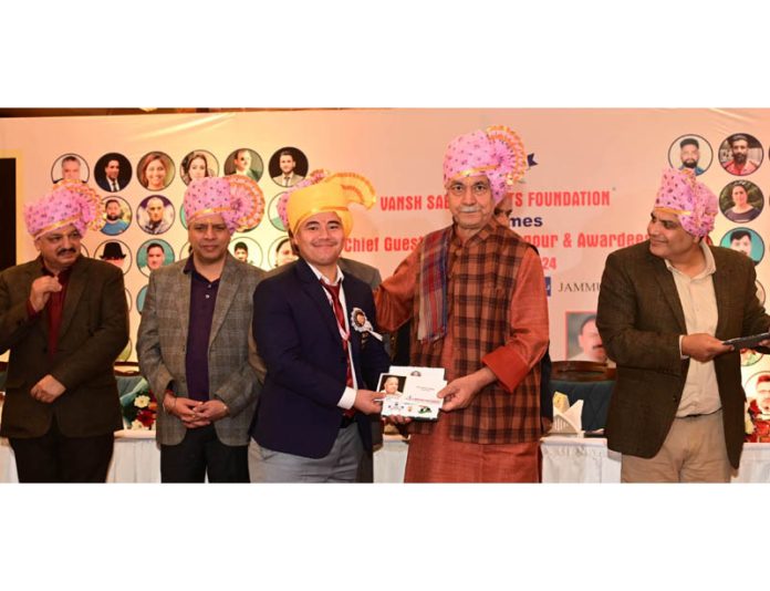 LG Manoj Sinha presenting the Prof. Chaman Lal Gupta Khel Ratna Award 2024 to the recipient for excellence in sports at Jammu on Tuesday.