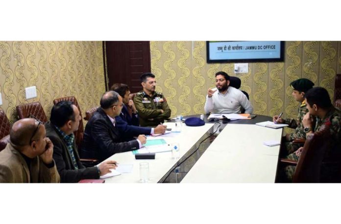 DM Sachin Kumar Vaishya chairing a meeting at Jammu on Thursday.