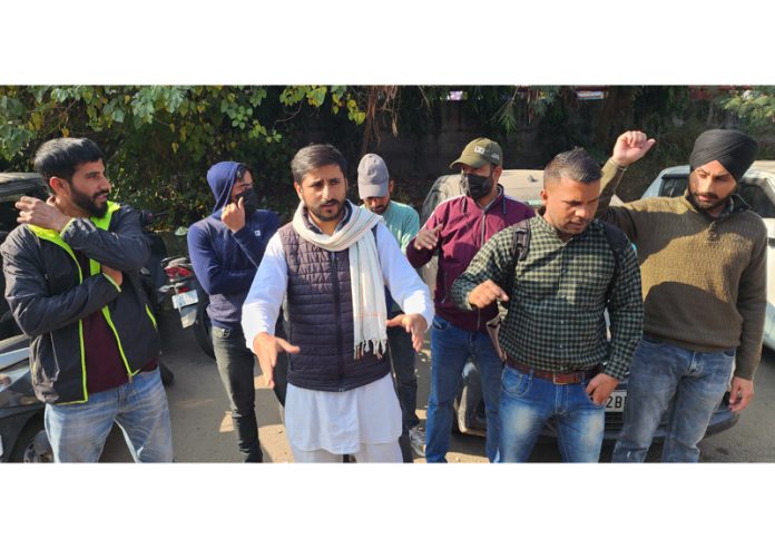 Overage youth protesting for age relaxation in J&K PSI exam near Press Club, Jammu on Monday.