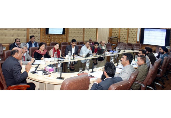 DyCM reviewing the functioning of Industries and Commerce Deptt in Jammu on Tuesday.