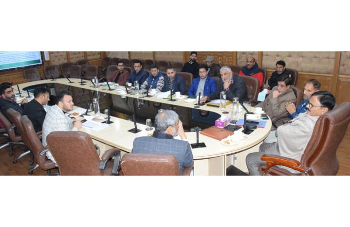 Minister Javed Ahmed Rana chairing a meeting.