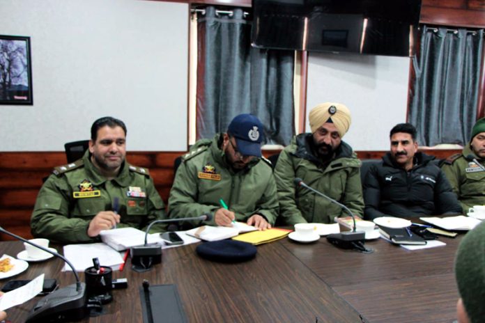 SSP Kulgam Sahil Sarangal chairing a meeting of police officers at DPO Kulgam on Saturday.