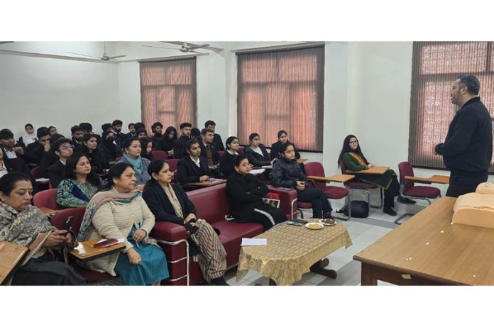 Dr Manish Manocha giving demonstration during workshop on Basic Life Support and Lifestyle Awareness.