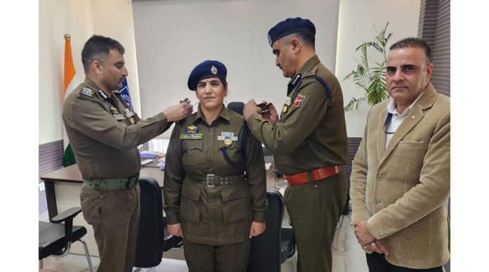 Newly promoted DySP Vimla Raina along with IGP Traffic and other police officers in Jammu on Thursday.