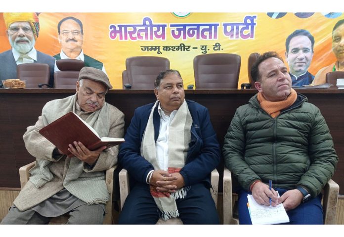 Sat Sharma, president, J&K BJP and Ashok Koul, Gen Secy during a function held in Jammu on Tuesday.