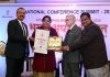 Dr Harleen Kour getting award in Bhopal.